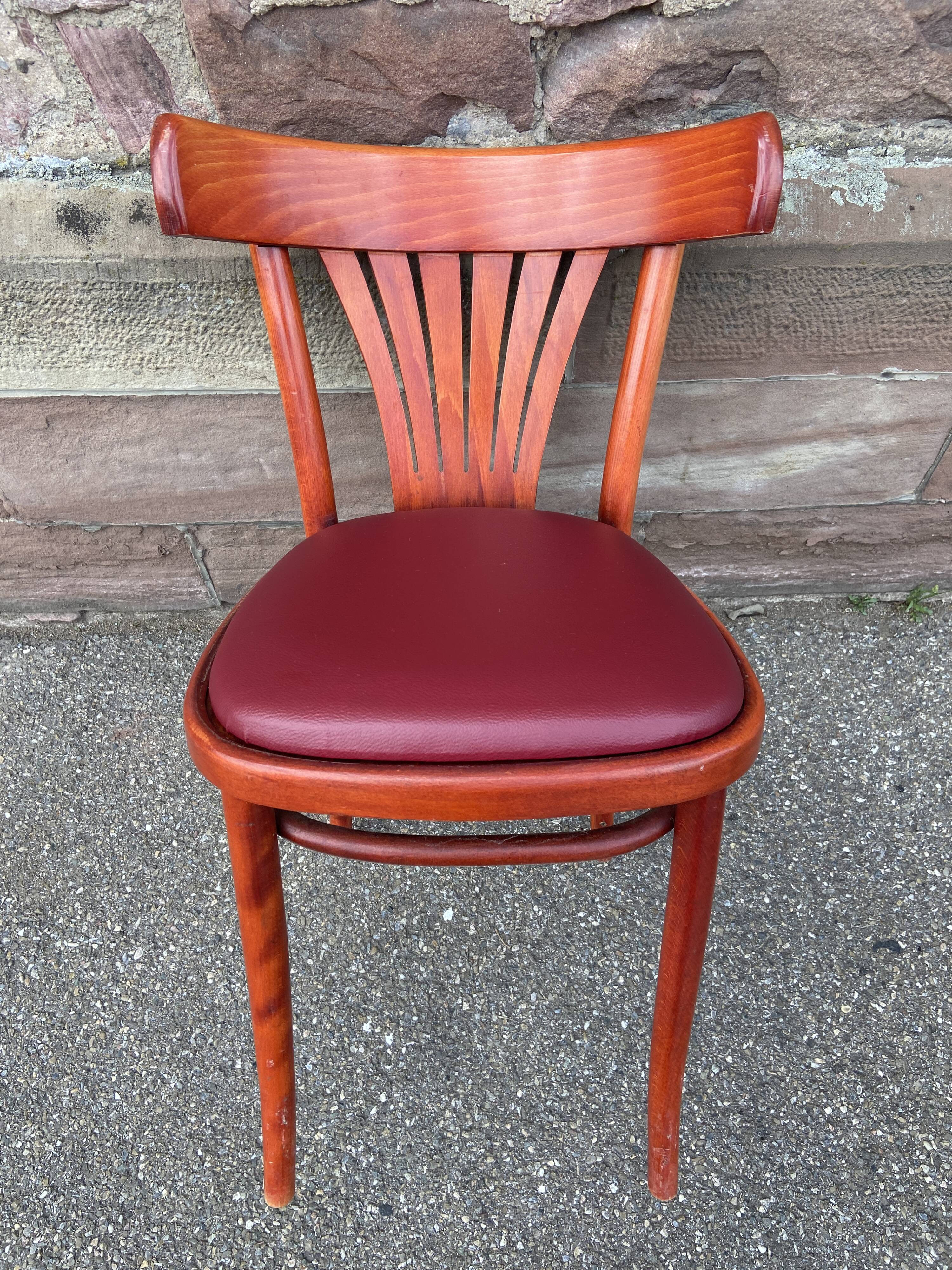 Pair of Alsatian bistro chairs in wood and leather, 1960