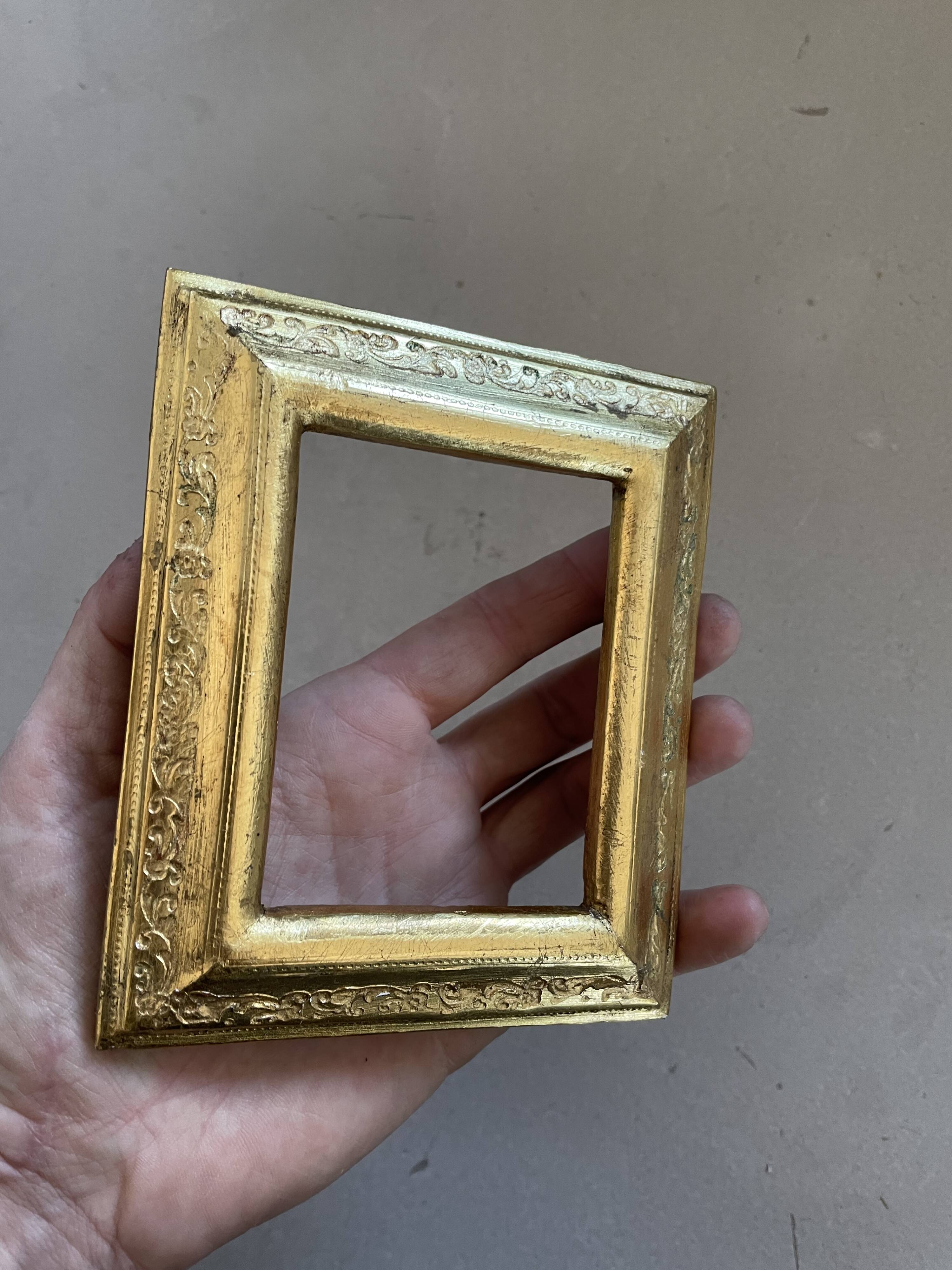 Small golden frame with old keys 10x12cm