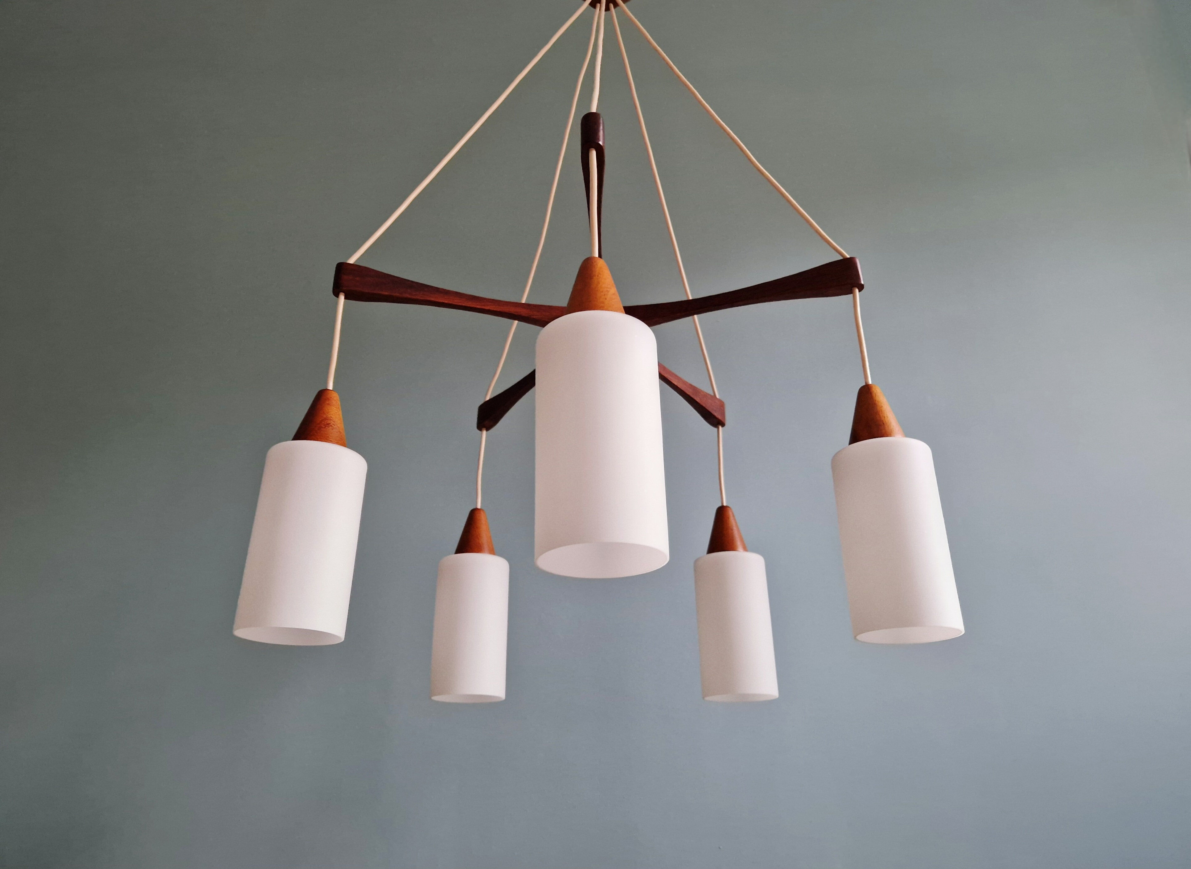 Large Scandinavian chandelier in teak and tubular white opaline, 1960.