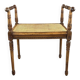 Banquette / tabouret en bois sculpté et cannage, XXe siècle