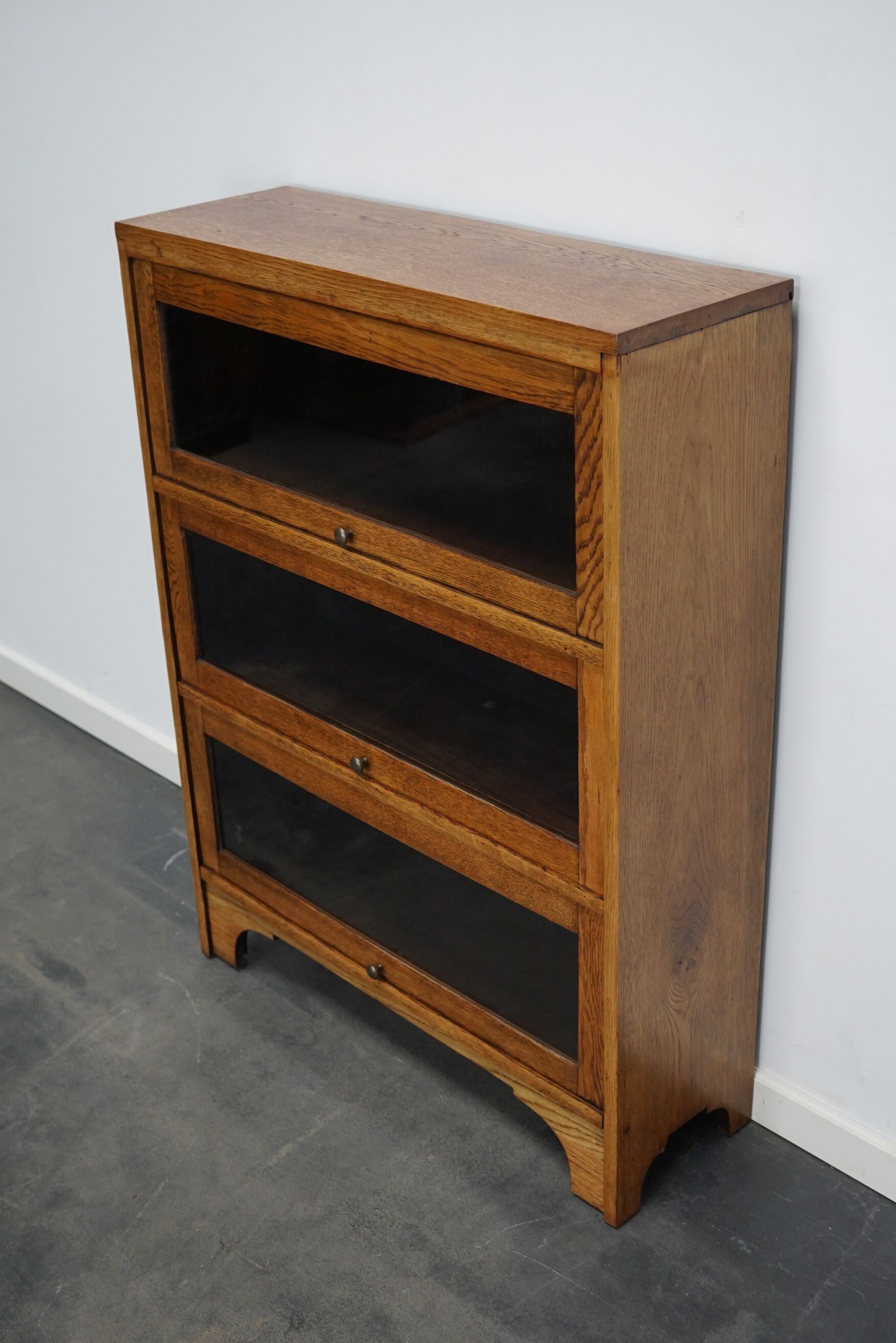 German Oak Bookcase with Folding Doors In Style of Globe Wernicke, ca 1930s