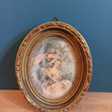 Oval frame wood gilded stucco patinated couple