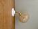 Vintage globe wall light in amber granite glass