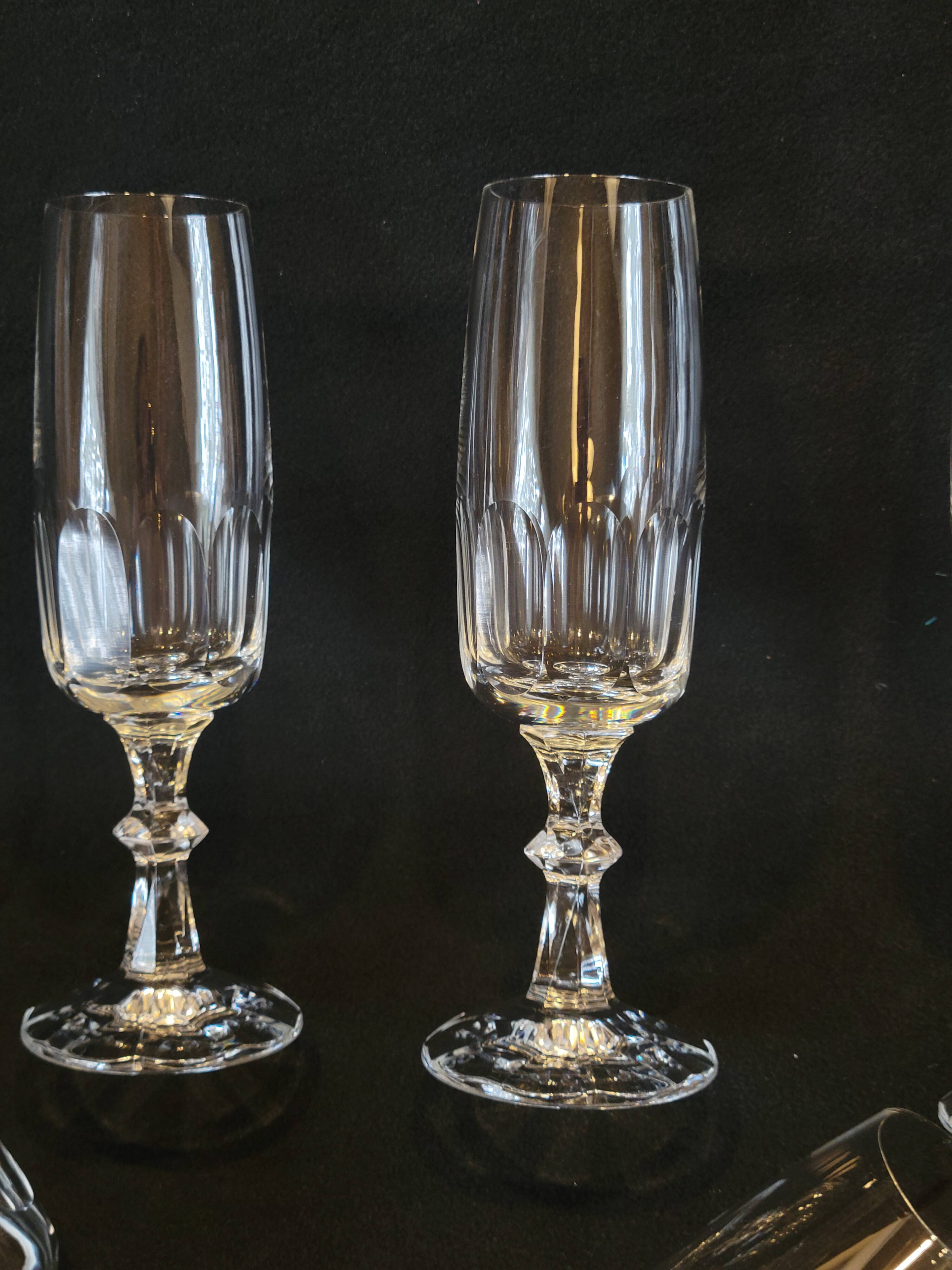 8 champagne flutes in flat cut crystal