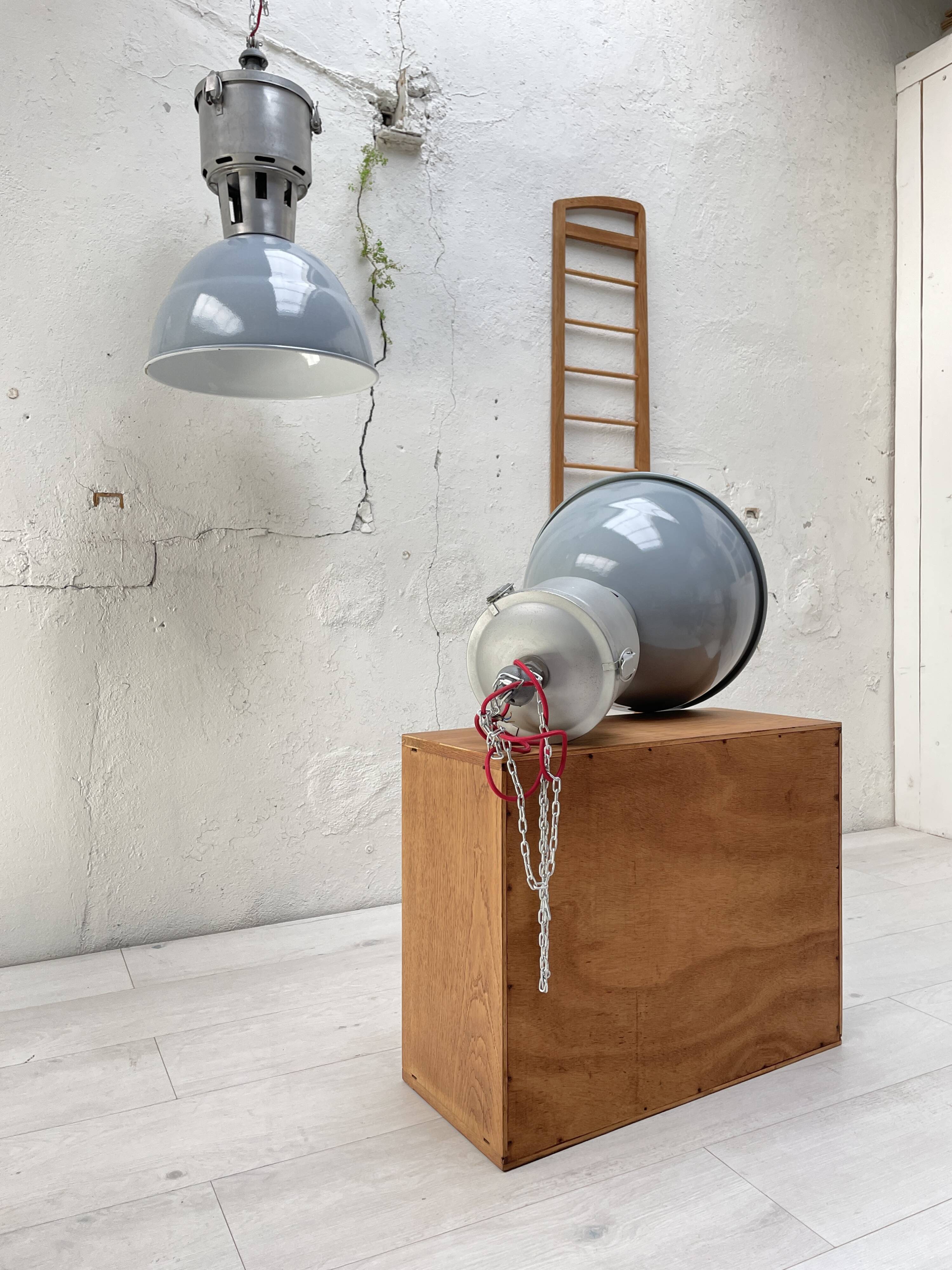 Pair of industrial lamps.
