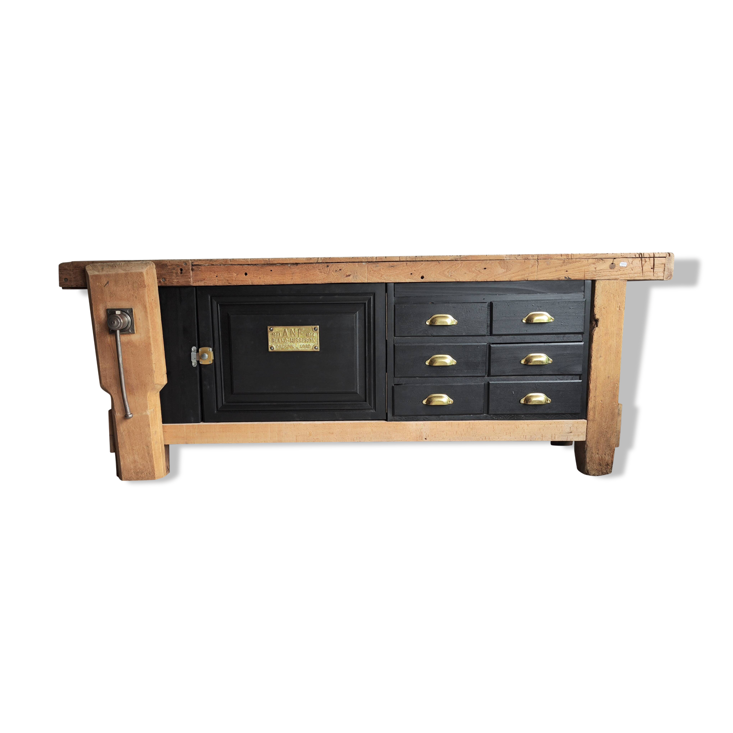 Old workbench furniture with six drawers and a door