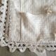 A handmade lace cushion cover