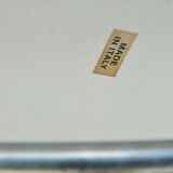 Armchair in chrome and leather