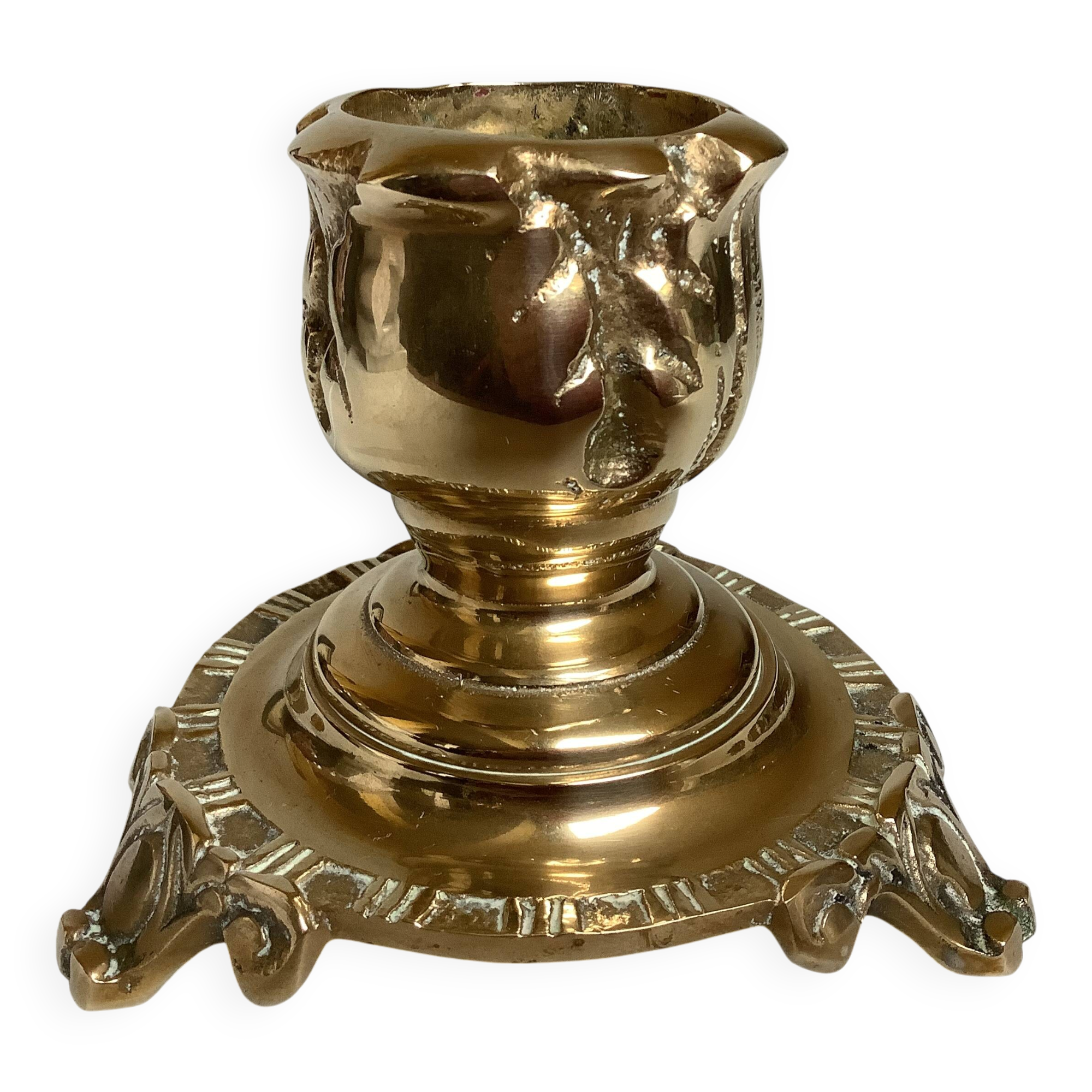 Tripod candlestick in worked bronze