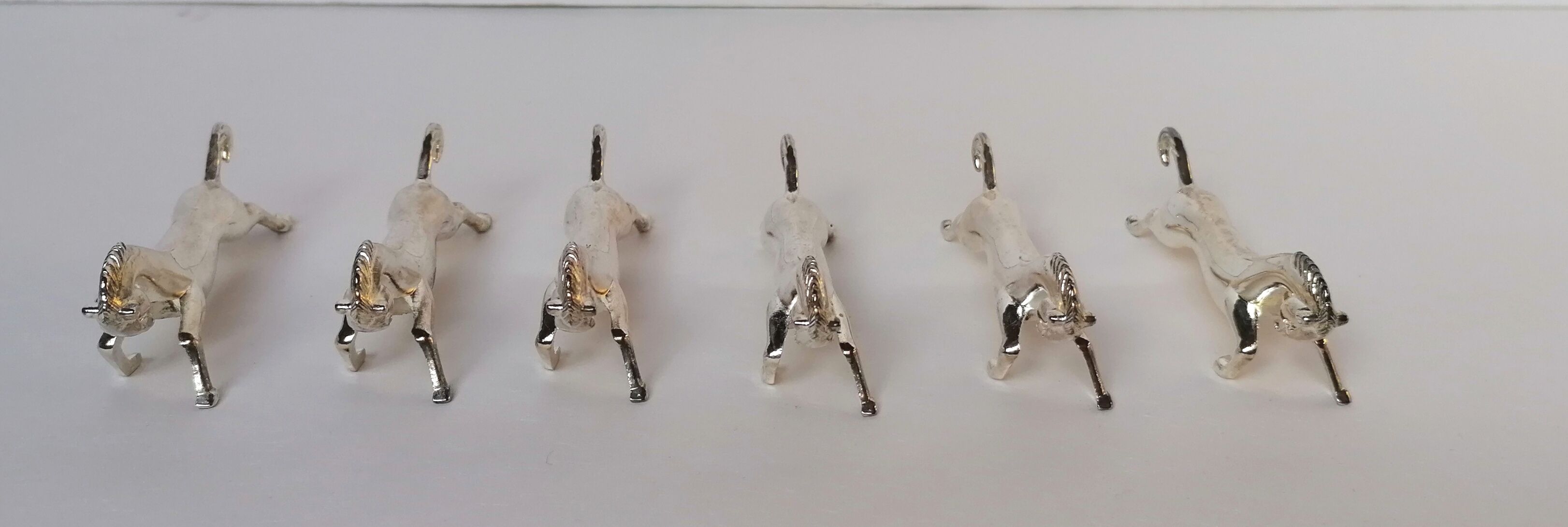 6 porte-couteaux métal argenté forme cheval