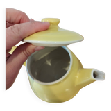 Théière en céramique jaune vintage