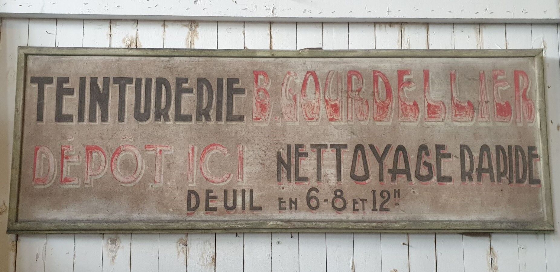 former big wooden advertising sign