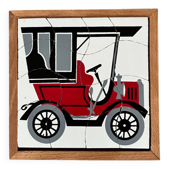 Wooden frame puzzle from the 60s/70s depicting a vintage car.