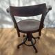 Swivel wooden armchair, pattern on seat