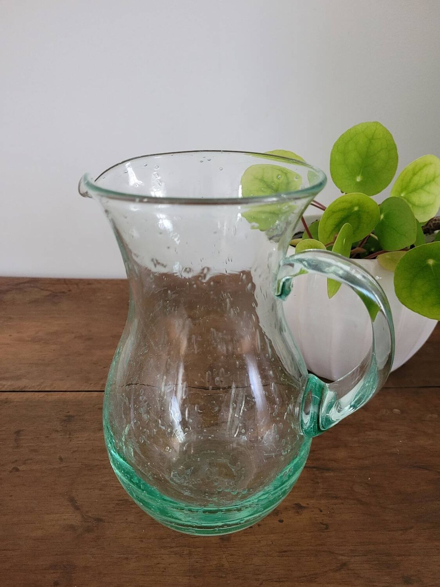 pitcher in green bubbled glass