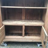Wooden cabinet with interior doors