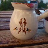 2 beige ceramic pots painted with signature