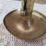 Brass push candle holder on frame