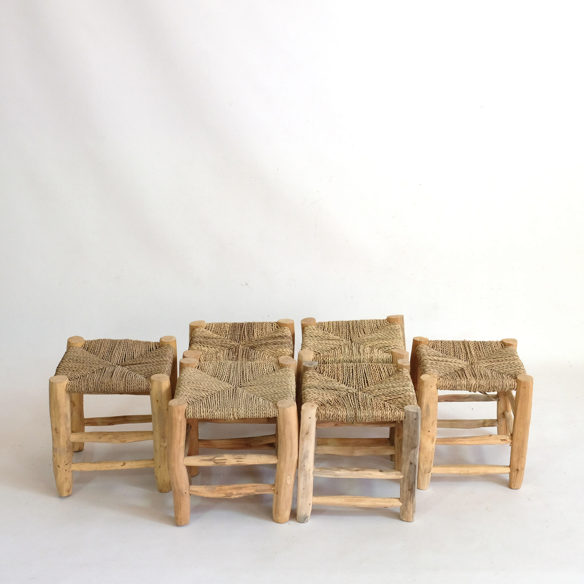 Minimalist stool made of wood and rope