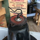 Hanging reflectolux mazda in black enamelled sheet metal.