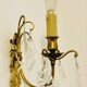 Brass wall light with glass pendants from the mid-20th century.