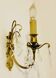 Brass wall light with glass pendants from the mid-20th century.