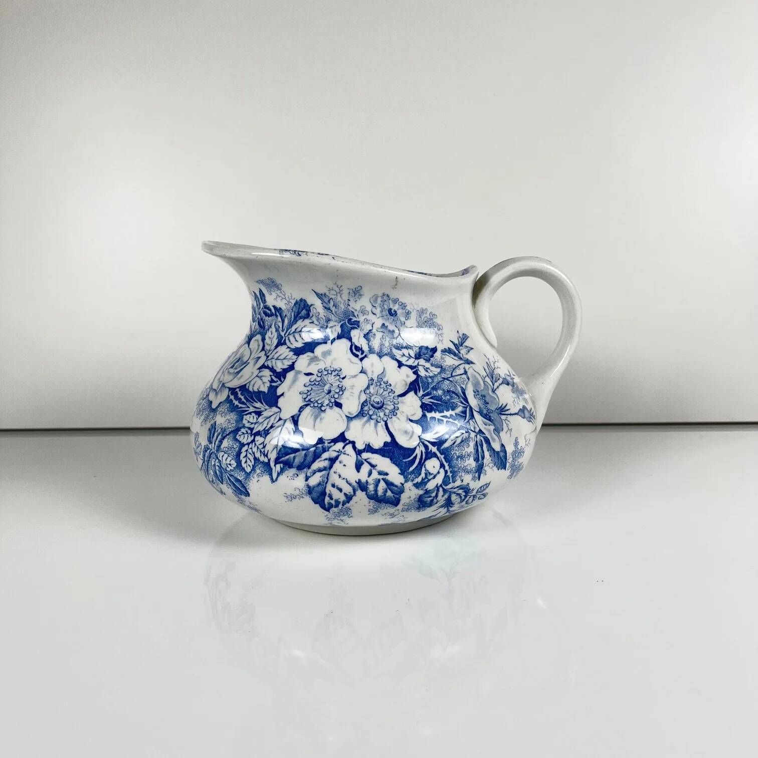 Chubby pitcher, old toilet jug KG Lunéville, blue flower pattern, late 19th to early 20th century.