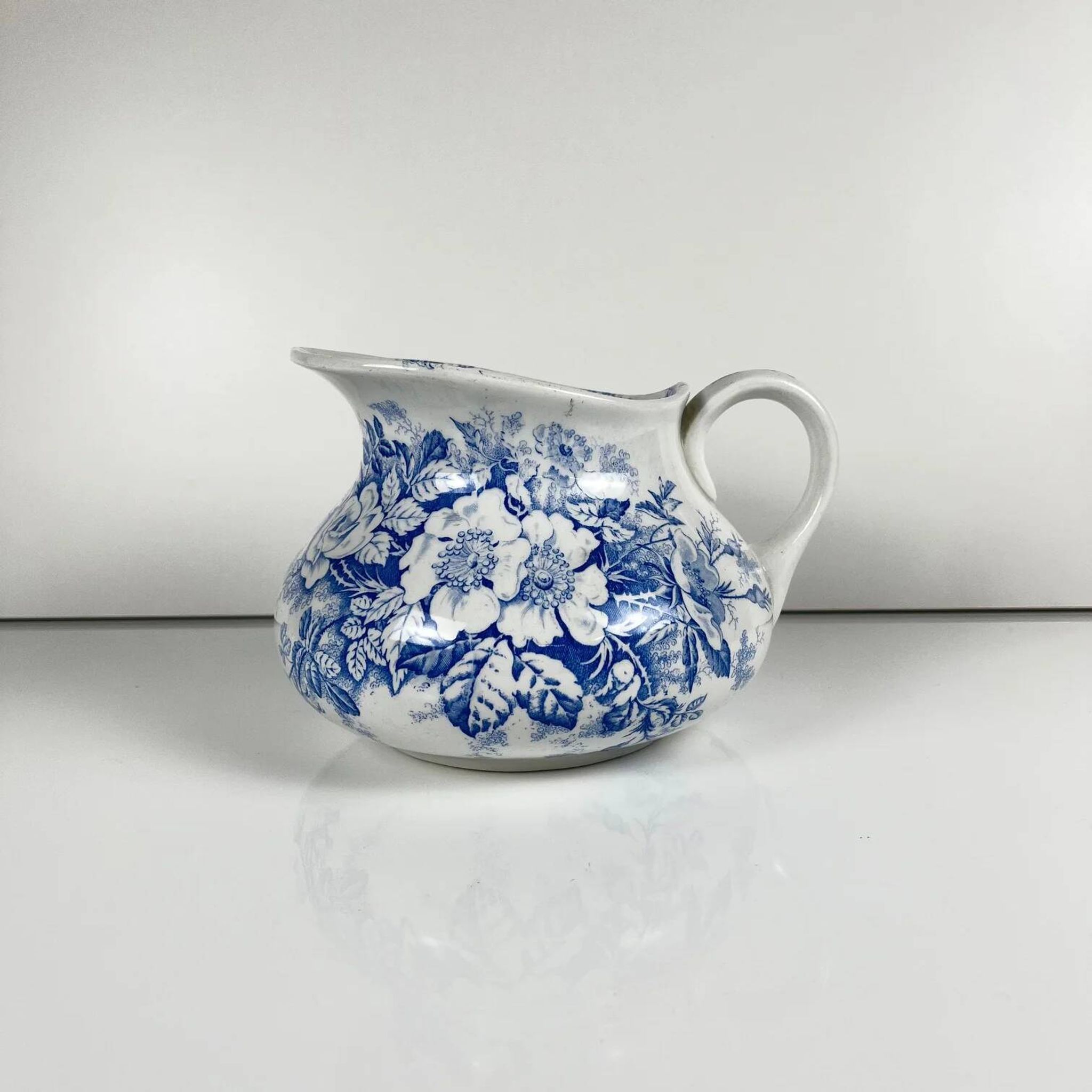 Chubby pitcher, old toilet jug KG Lunéville, blue flower pattern, late 19th to early 20th century.