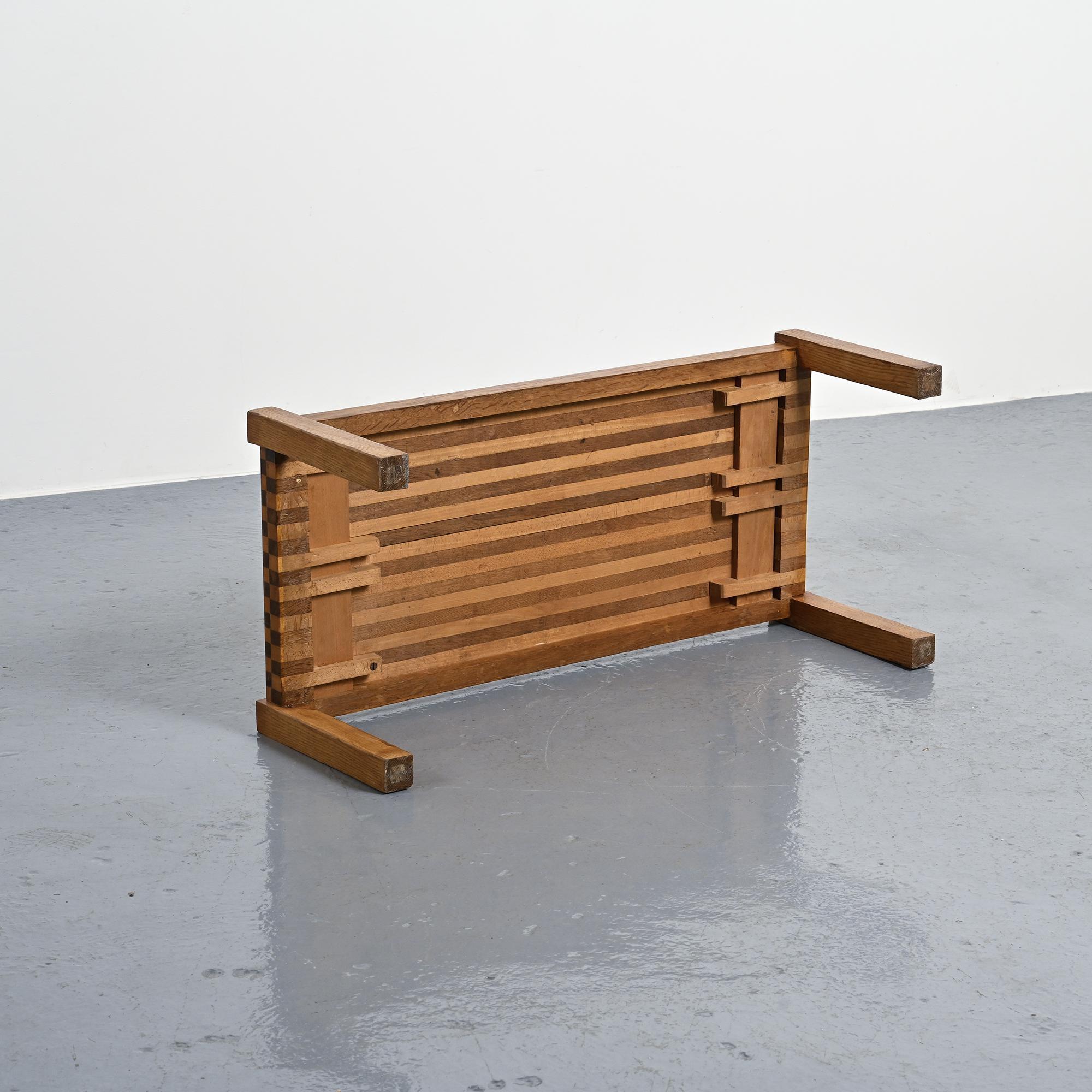 Two-tone wooden graphic coffee table, circa 1960.