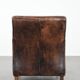 Sleekly shaped timeless design armchair made of sheepskin leather