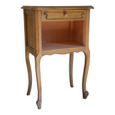 Wood and pink bedside table