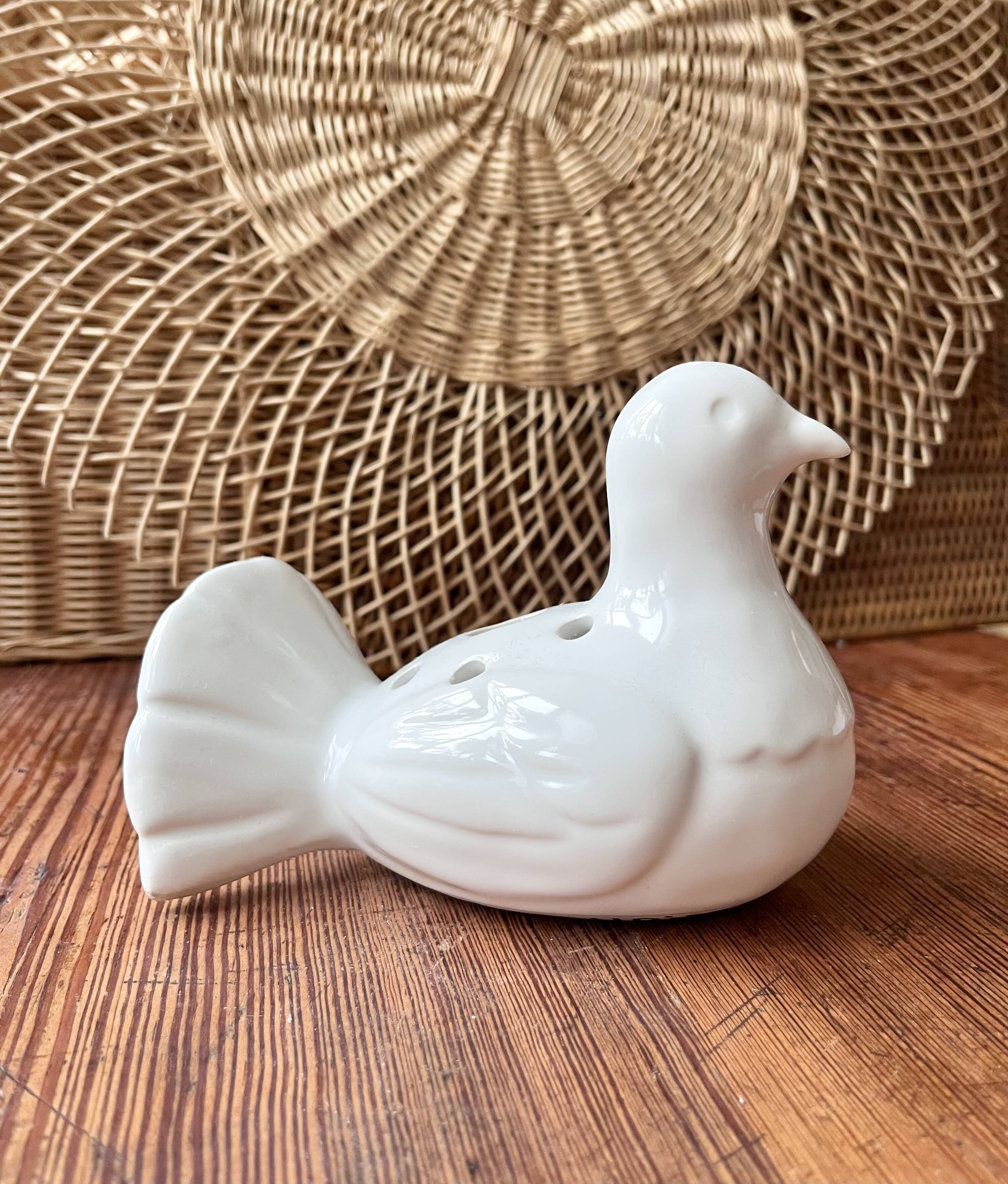 Ceramic vase bird flower spike