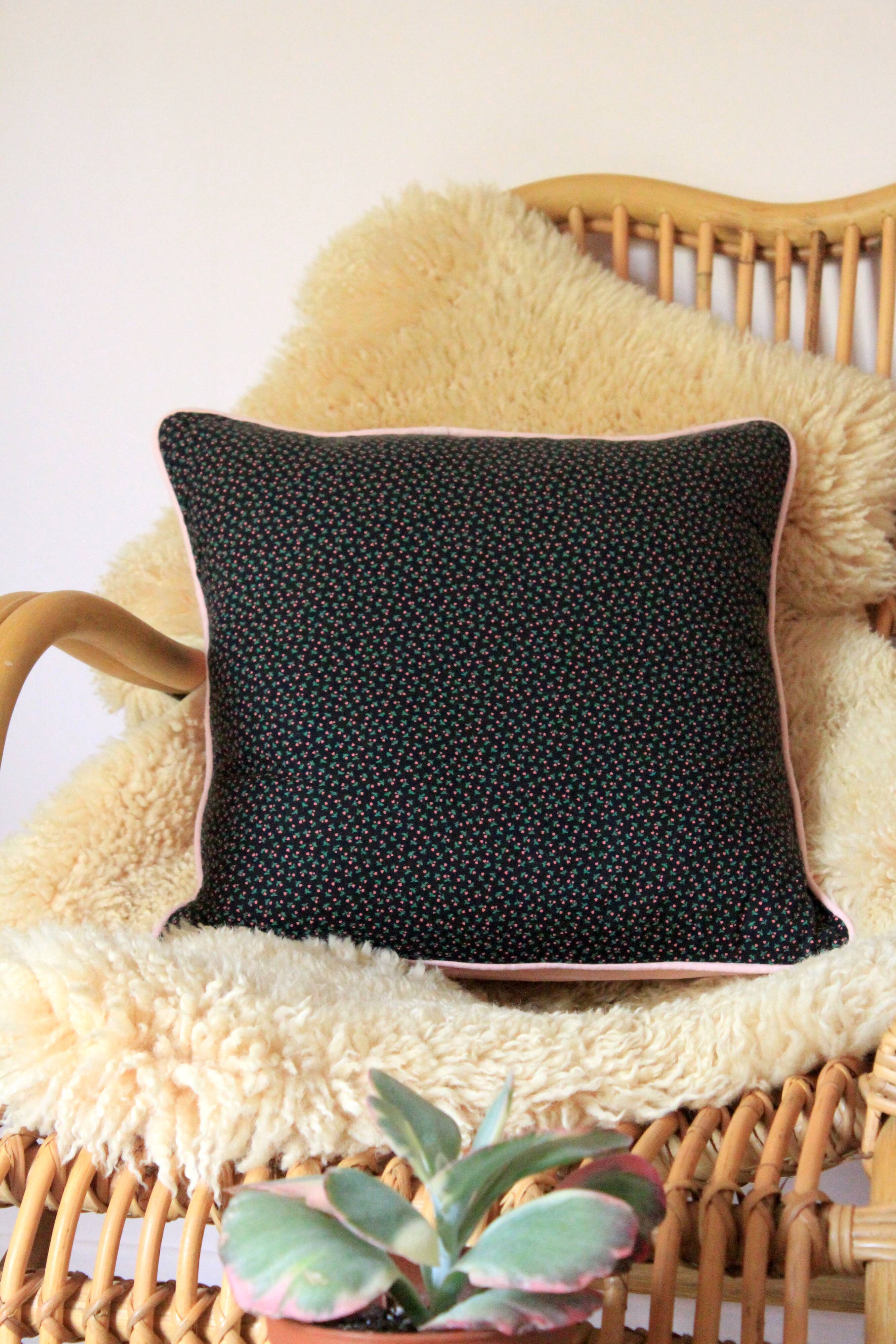 Black and pink liberty square cushion