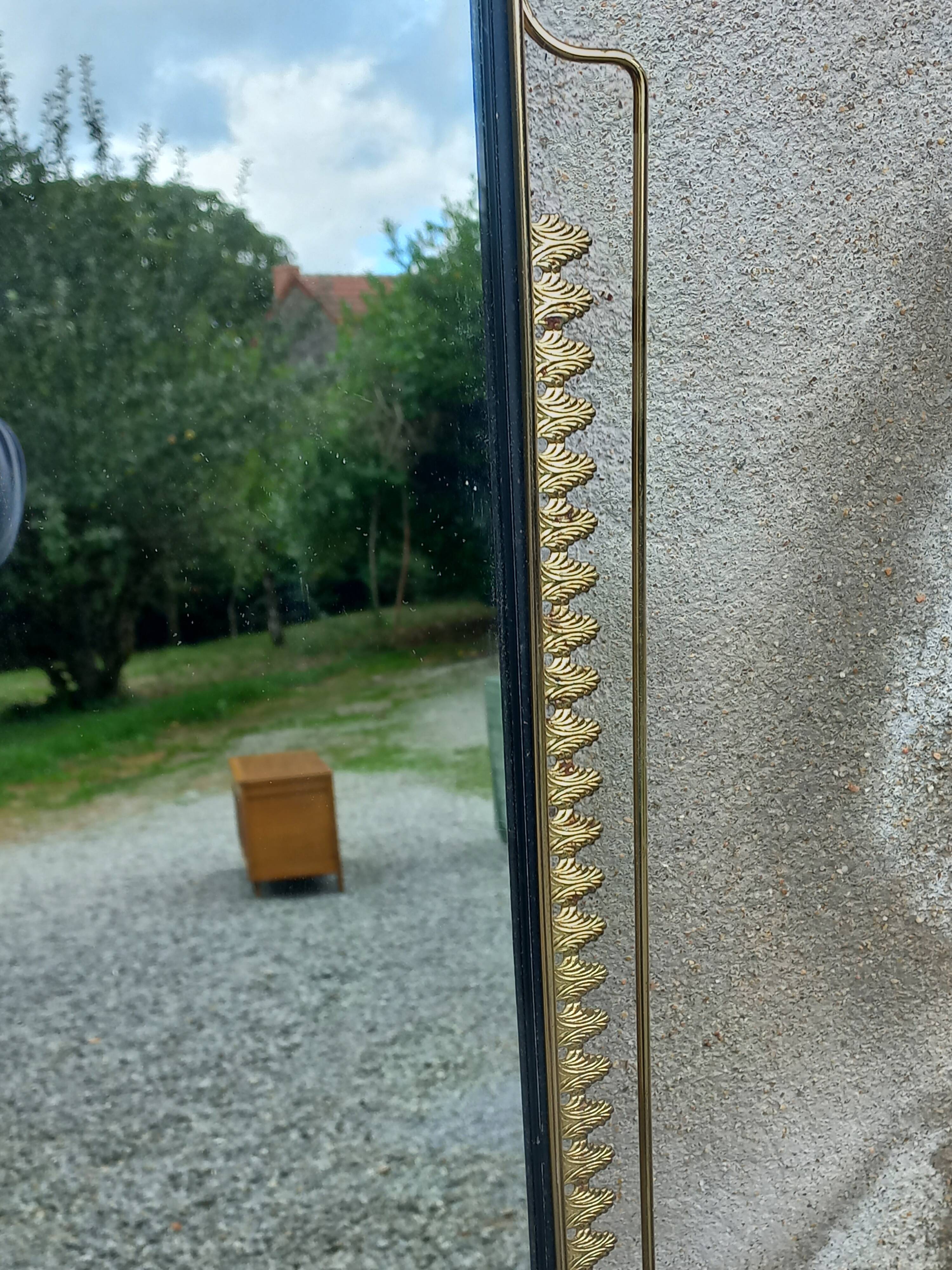 Vintage 1950s neoclassical style gold metal mirror