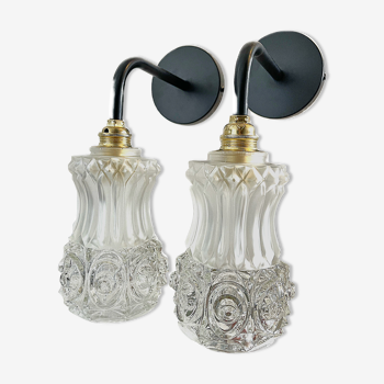 Pair of vintage wall lamps in electrified pressed molded glass to nine
