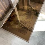 Coffee table with chrome base and mirrored glass top, vintage solar flare decor