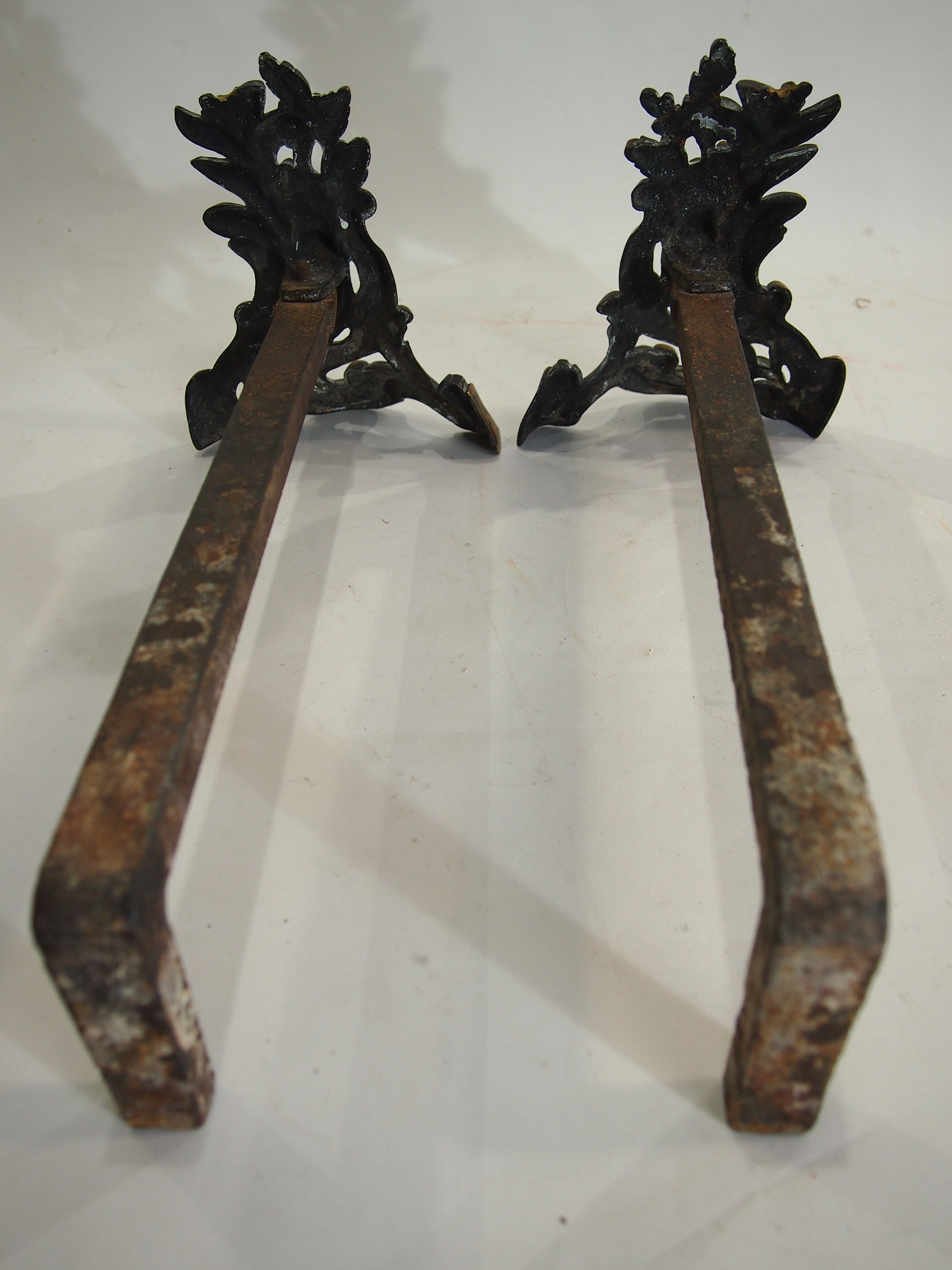 Pair of chimney tracks in bronze
