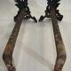 Pair of chimney tracks in bronze