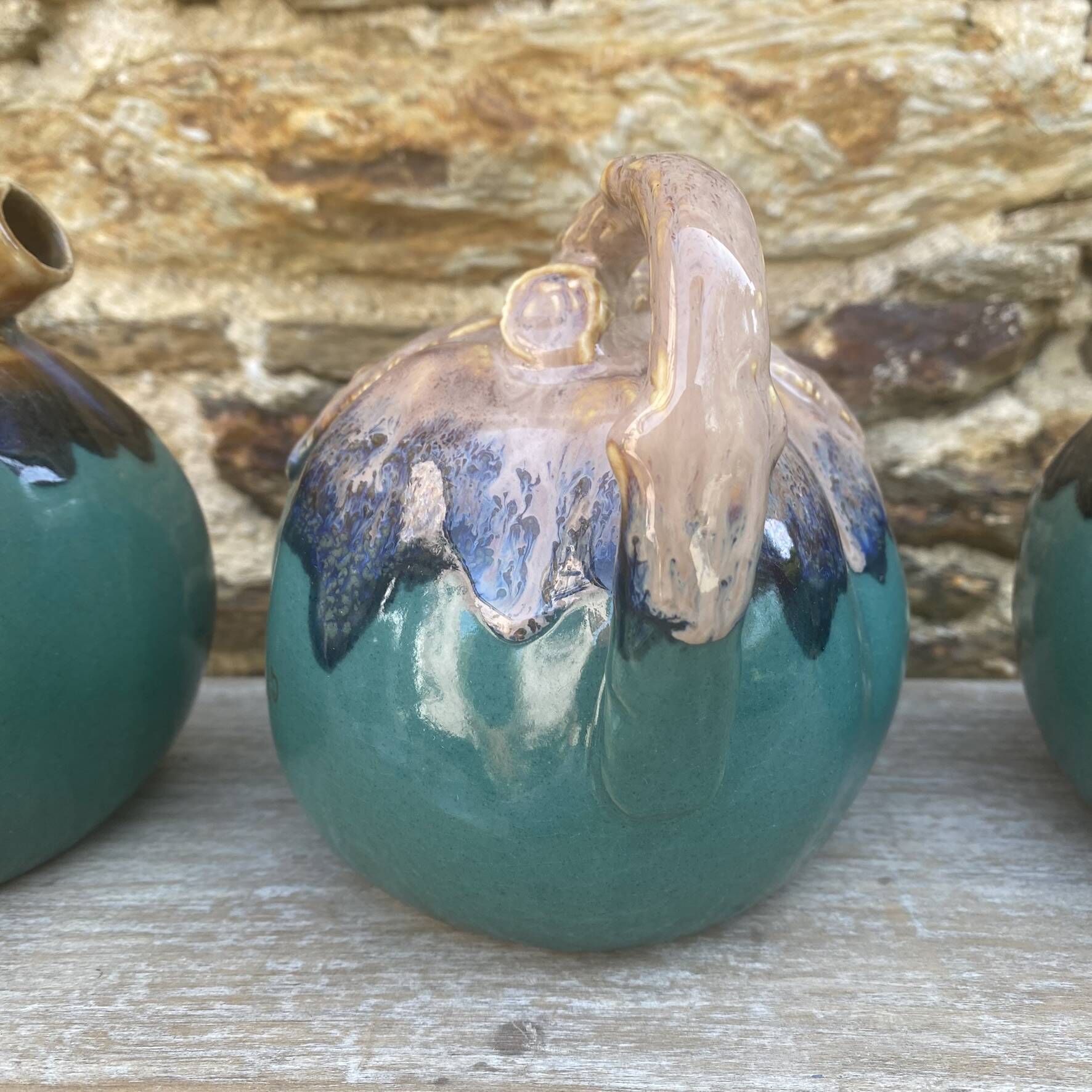 Alpho ceramic apple bottles from the 60s-70s.