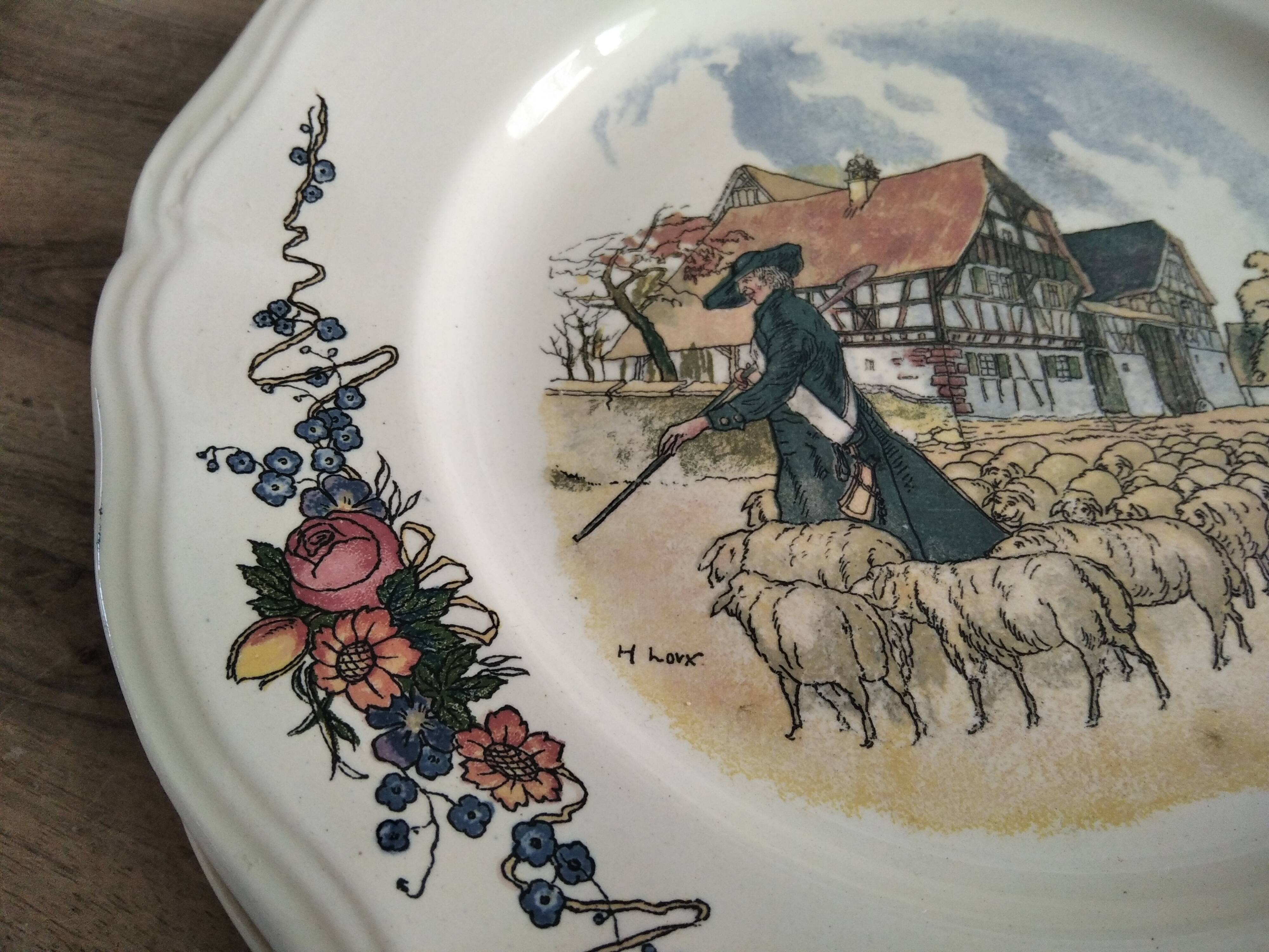 6 plates of the obernai decoration service by Henri Loux