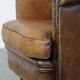 Characterful sheepskin leather club armchair with a luxurious, rustic appearance
