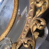 Miroir ovale en bois doré