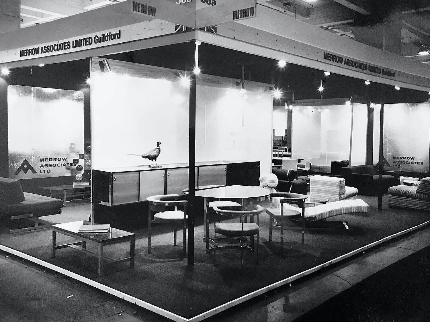 Round table glass chrome Merrow Associates Robert Young