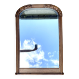 Beveled art deco mirror, carved wood