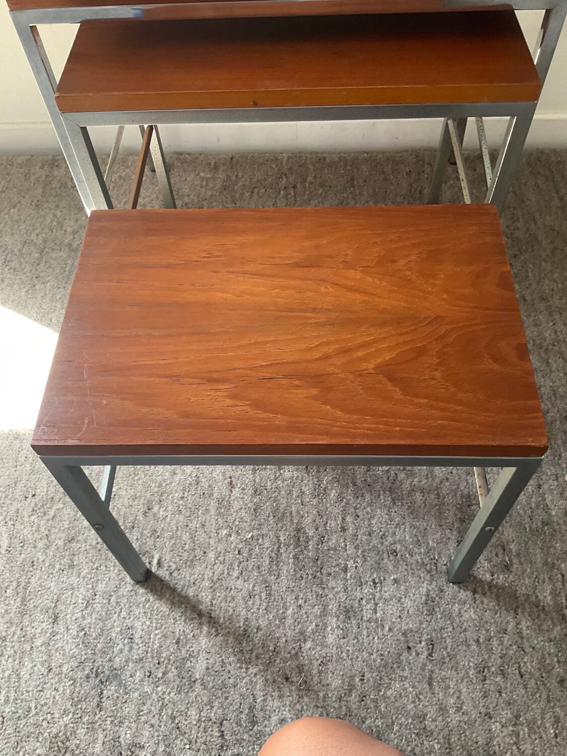 Trio of teak and chrome metal nesting tables from the 60s-70s