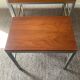 Trio of teak and chrome metal nesting tables from the 60s-70s