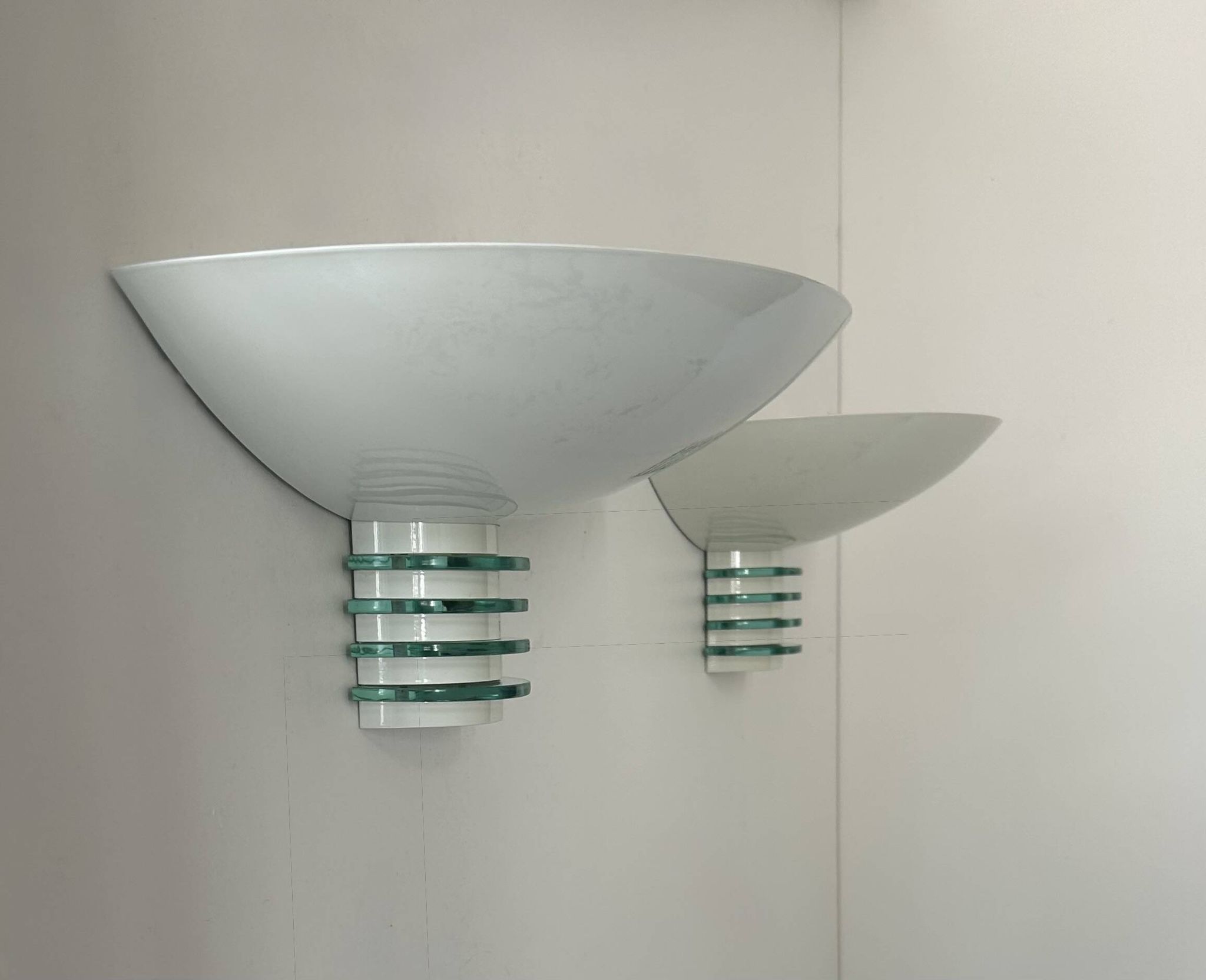Pair of post-modernist wall lights, white metal and glass, France 1980