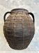 Artisan clay amphora with wire mesh, Romania, circa 1950
