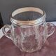 Twisted moulded glass bistro champagne bucket with a silver metal collar.