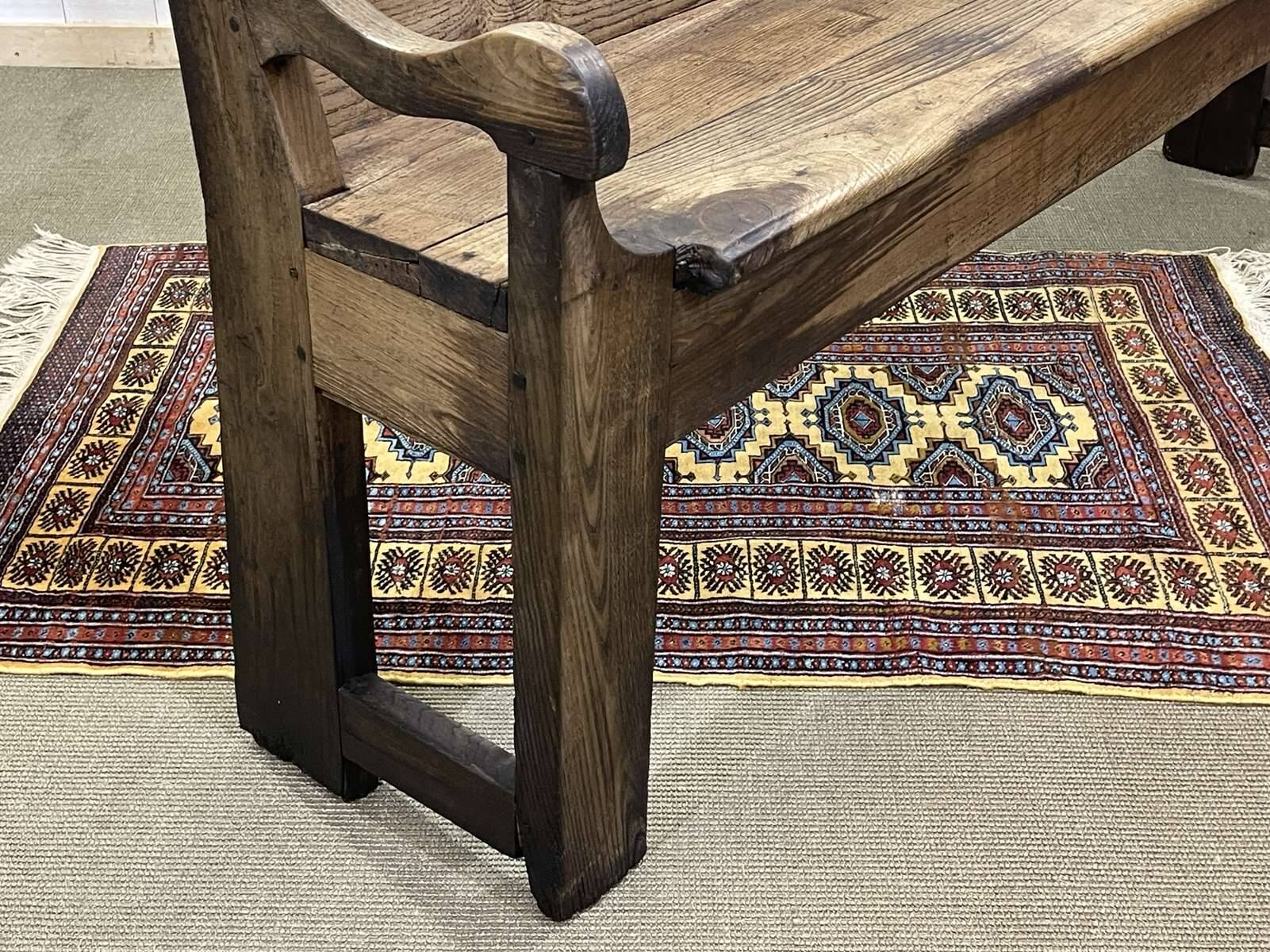 Rustic chestnut bench from the late 19th century.